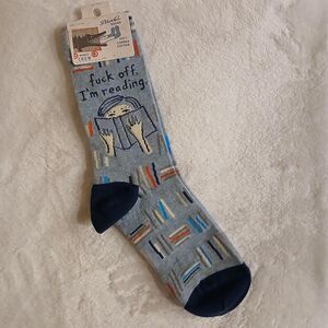 Blue women's size 5 to 10 socks that say "f off I'm reading" w woman reading